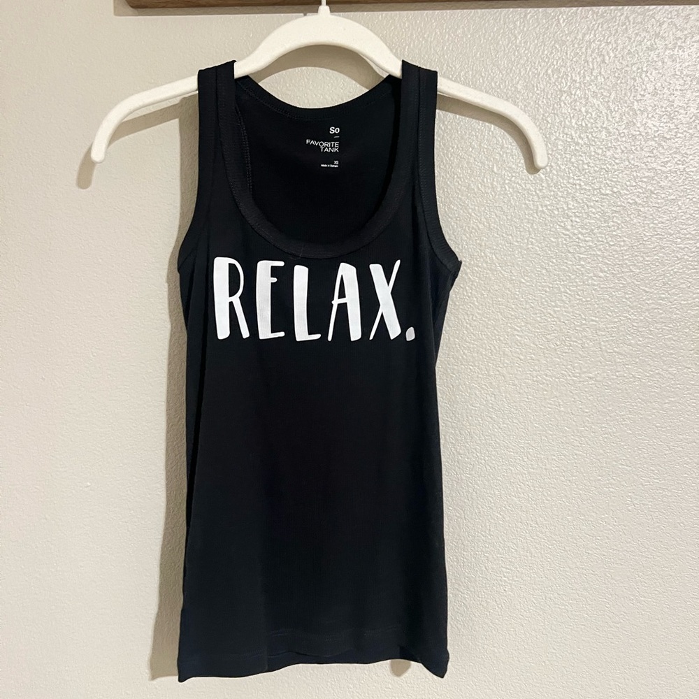 Ribbed Tank with “Relax” written on it.